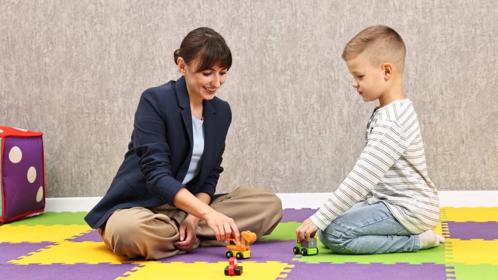 ABA therapist and kid with autism level 2