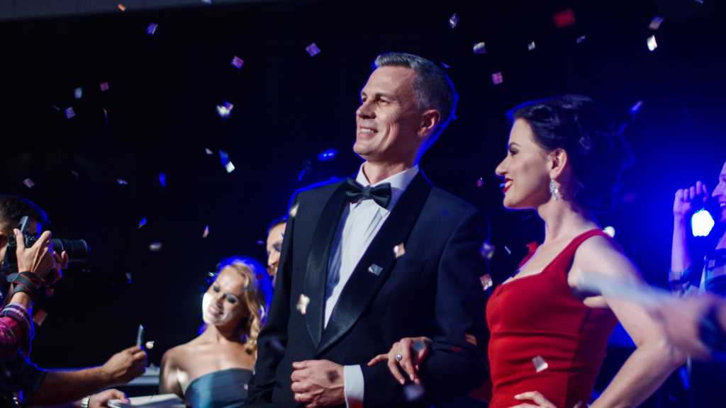 Celebrities on the red carpet, representing autistic characters in media and pop culture icons supporting neurodiversity