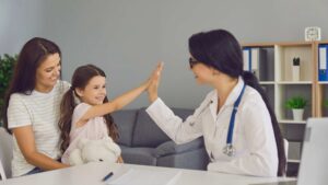 Child interacting positively with doctor during autism evaluation