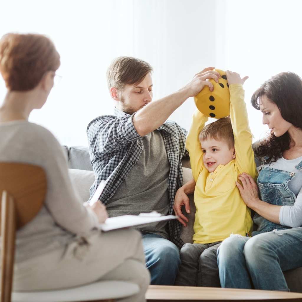 Parents and child participating in a consultation with an ABA therapy provider