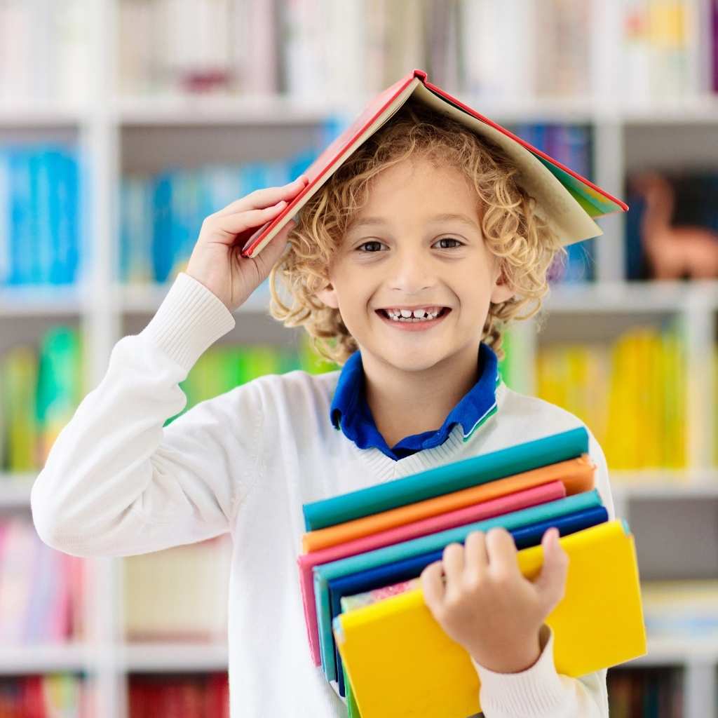 Smiling student with autism in school holding books and feeling confident