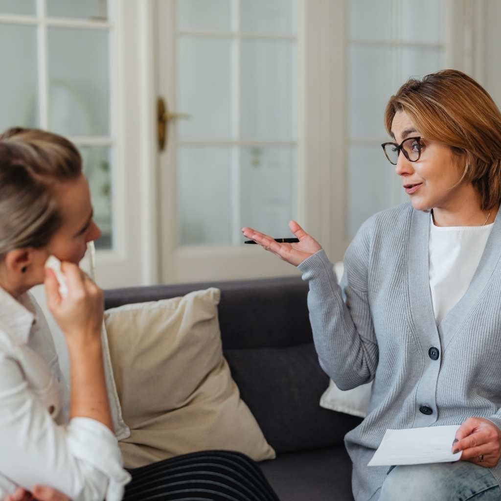 Parent talking and explaining autism to family member