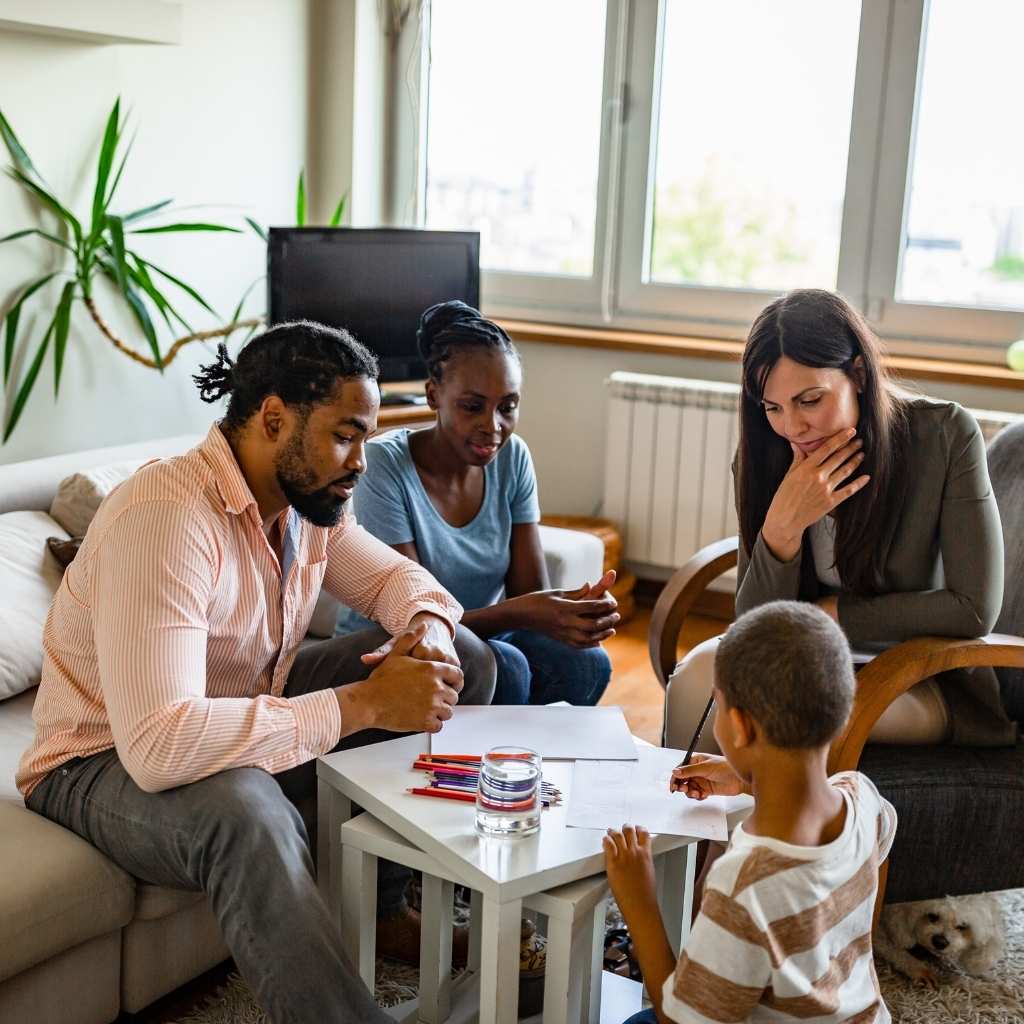 Family meeting with a professional to discuss when to start ABA therapy for autism