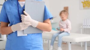 Healthcare specialist preparing for child autism evaluation appointment