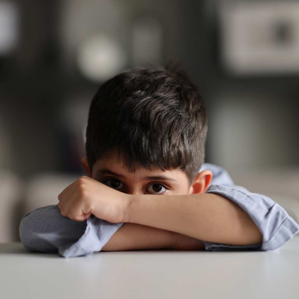 Young child with autism diagnosis process during diagnosis process with limited eye contact